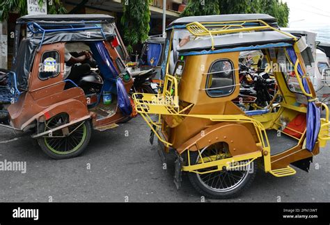 Motorized tricycle (Philippines) .